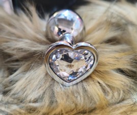 PLUG ANAL M CROMADO CORA��O PEDRA TRANSPARENTE